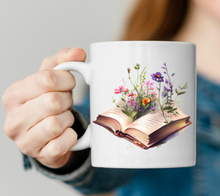 Load image into Gallery viewer, Cup of Tea and Good Book Design 11oz Mug
